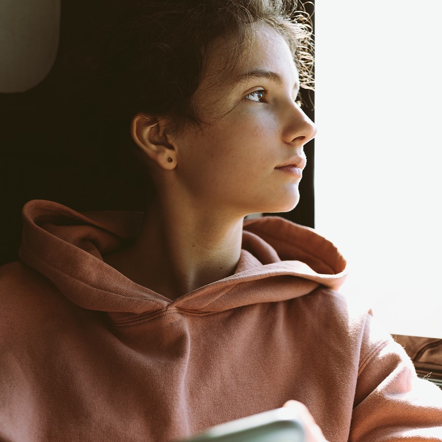 A woman searching online "Is Abortion Legal in Kansas?"