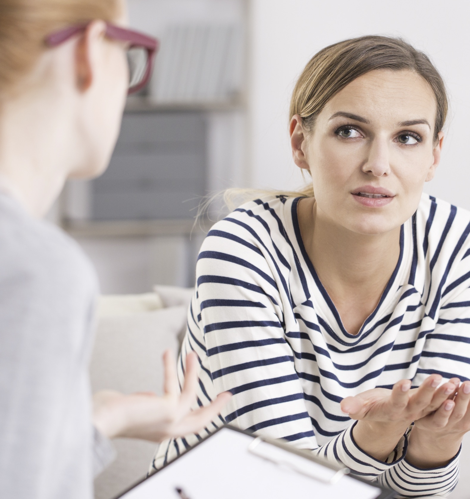 A woman receiving pregnancy option information in Liberal, Kansas