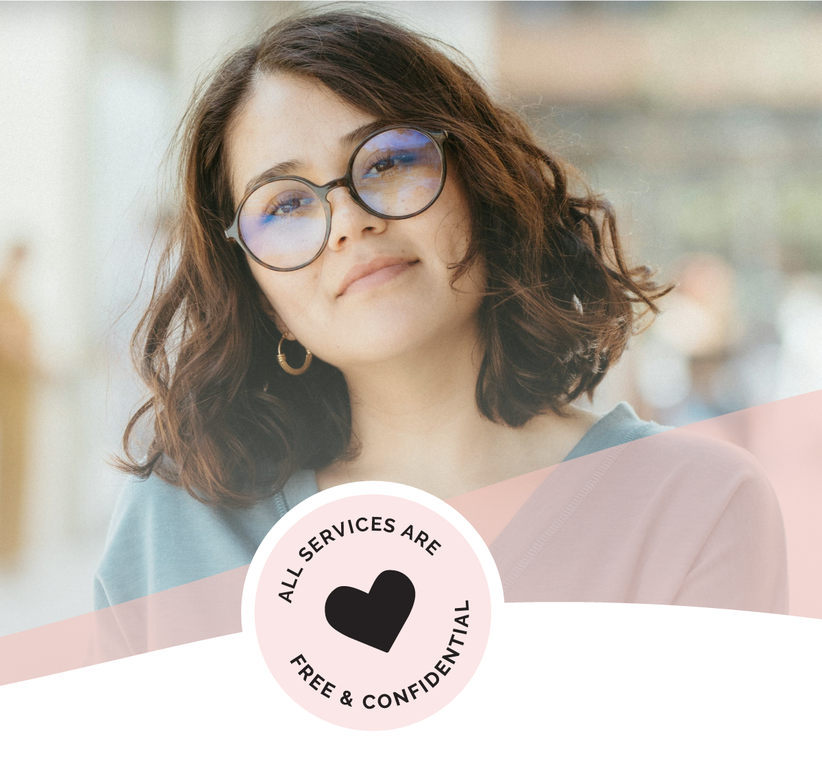 A woman smiling because she knows All Pregnancy Services are Free & Confidential at Grace Place Pregnancy Care Center in Liberal, Kansas